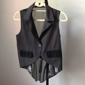 Lightweight gray vest.